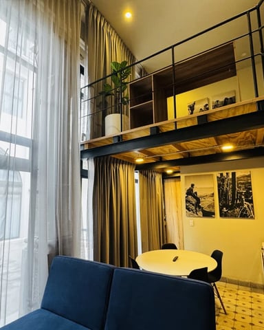 Double-height loft with sofa bed at Sonata